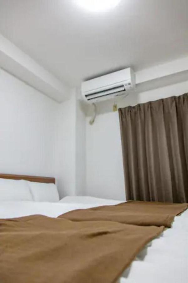 Apartamento Ash Court Joto Osaka Exterior foto